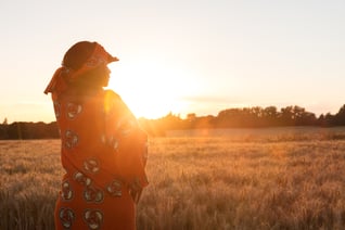 Rural farmer examining fields